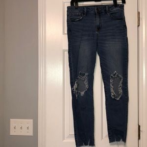 Distressed denim jeans